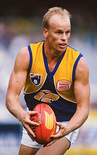 1990's AFL - Collingwood v West Coast Dean Kemp of the Eagles in action during the 1990's AFL match between the Collingwood Magpies and West Coast Eagles.